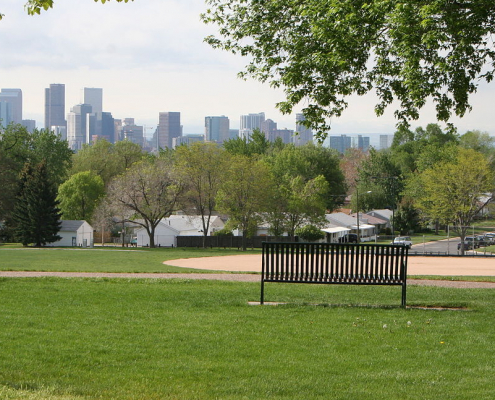 Bench in park overlooking Denver
